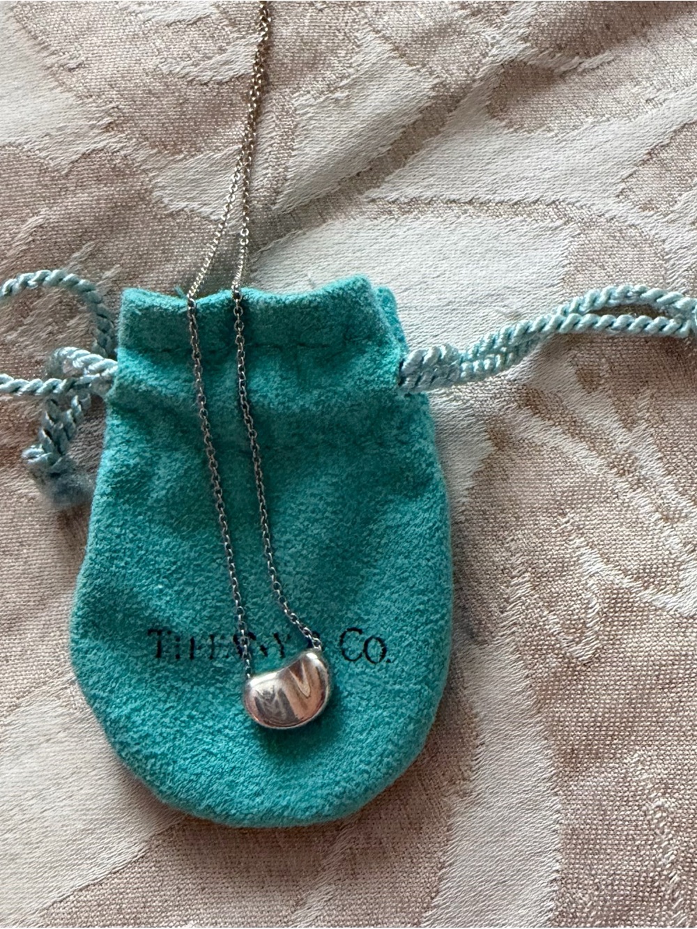 Tiffany & Co. Signature Silver Bean necklace by Elsa Peretti
